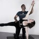 Anna Tetlow being trained by The Garuda Method founder, James D'Silva. Photo courtesy of Tetlow.