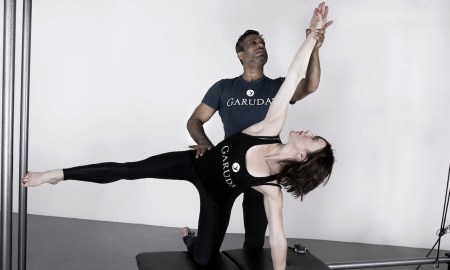 Anna Tetlow being trained by The Garuda Method founder, James D'Silva. Photo courtesy of Tetlow.