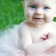 baby in basket with tutu